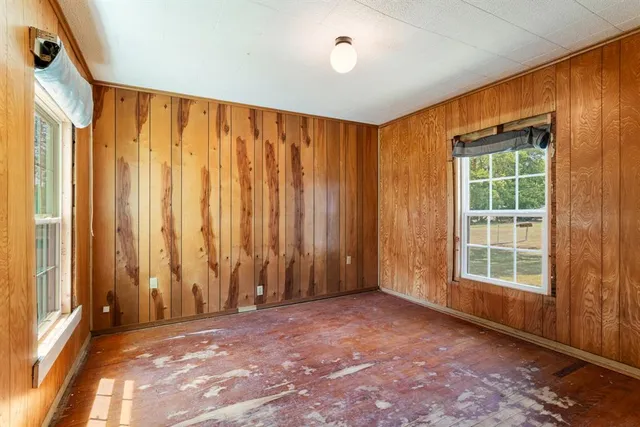 an empty room with windows