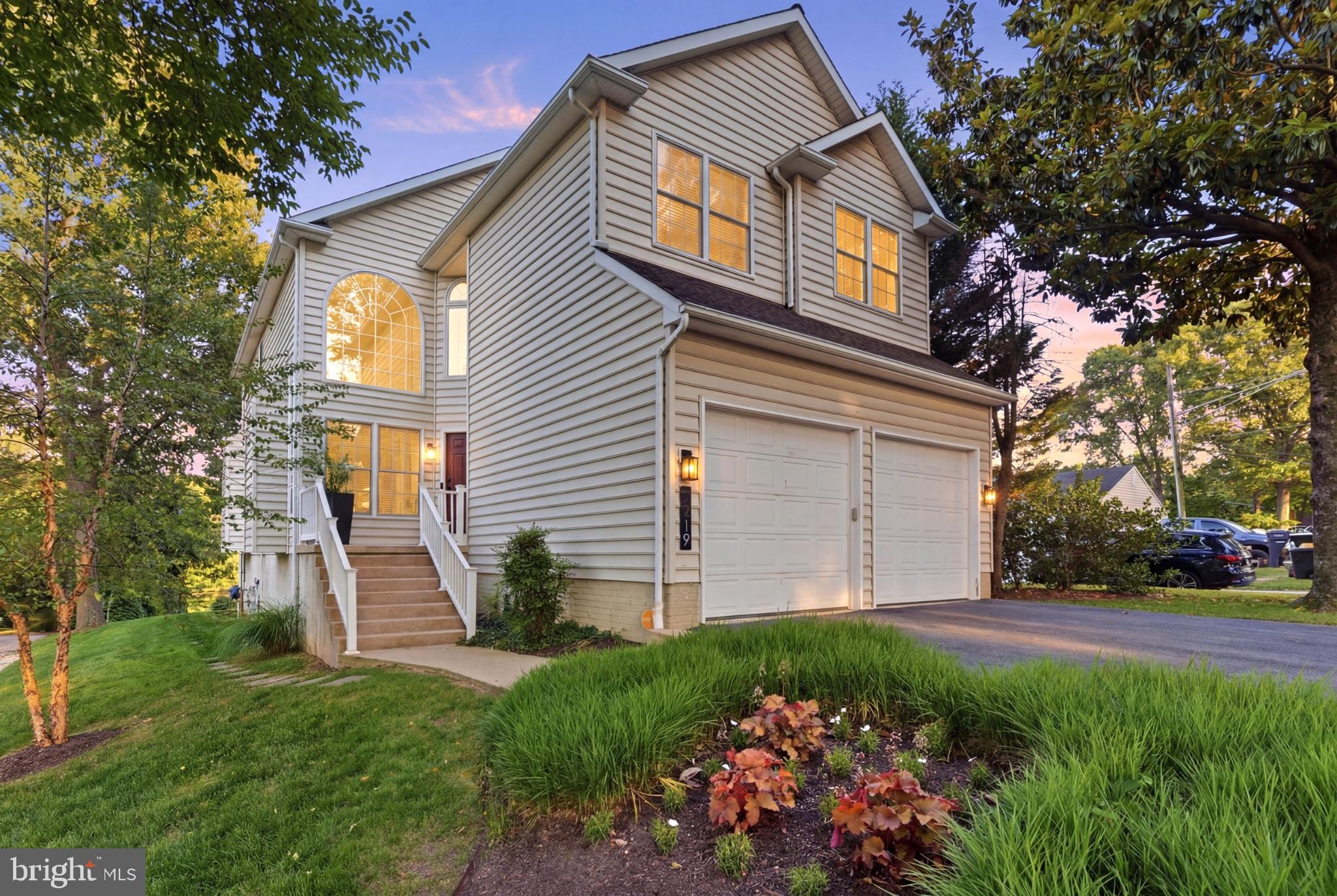 Charming home with lush greenery.