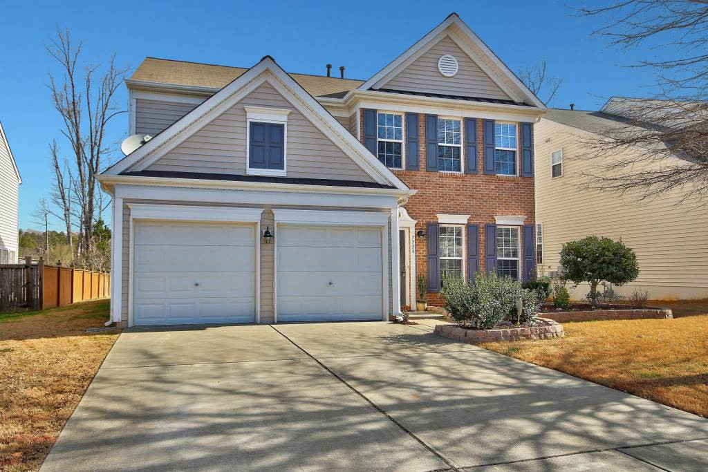 7754 San Gabriel Street Raleigh, NC 27613 - Photo 3 of 25 New landscaping is inviting and offers great curb appeal. Exterior Front