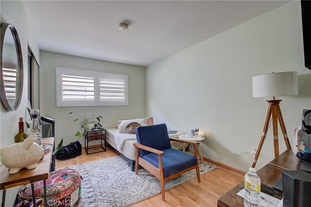 655 Alexander Street, Unit 3 Glendale, CA 91203 - Photo 13 of 26 a living room with furniture and a wooden floor