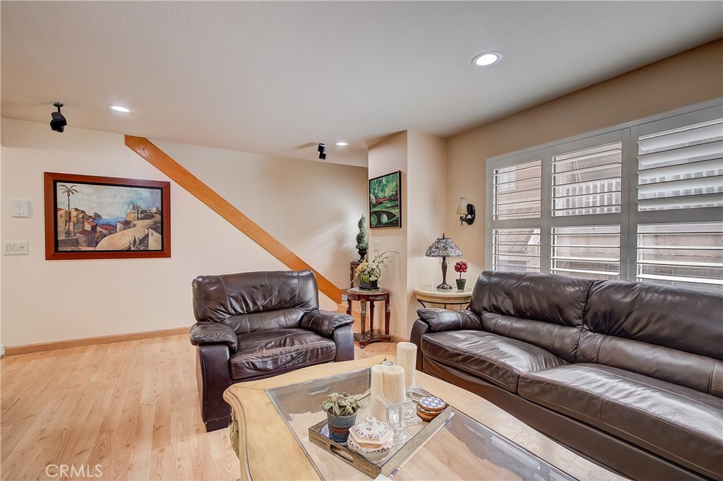 655 Alexander Street, Unit 3 Glendale, CA 91203 - Photo 5 of 26 a living room with furniture and a wooden floor