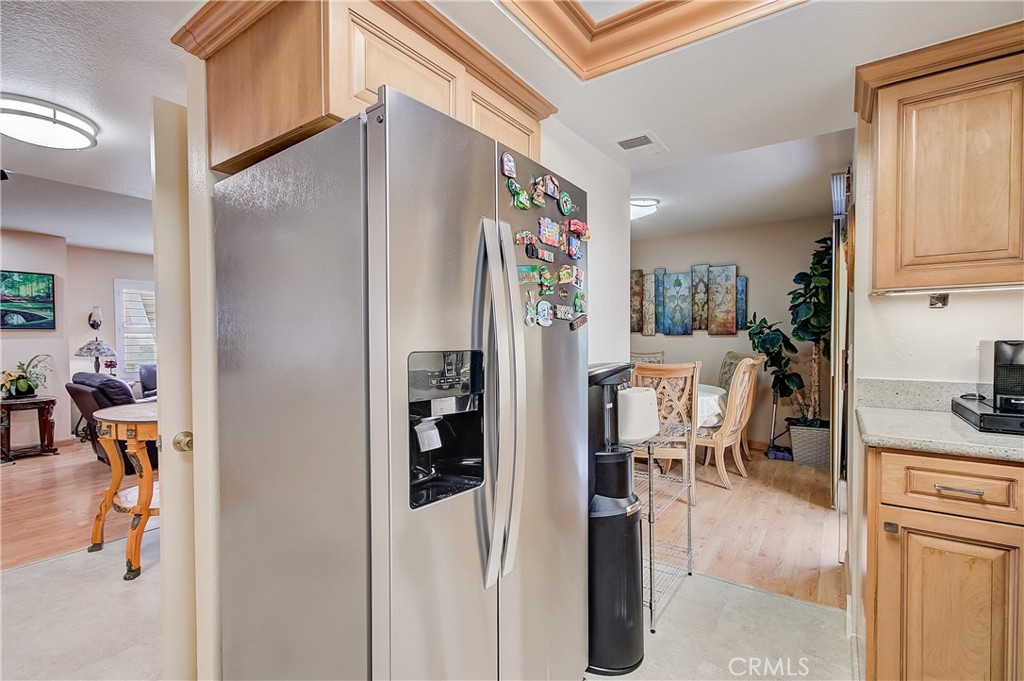 655 Alexander Street, Unit 3 Glendale, CA 91203 - Photo 10 of 26 a workspace with kitchen area and a refrigerator