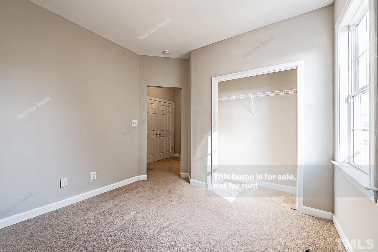 8909 Sauls Road Raleigh, NC 27603 - Photo 18 of 23 a view of an empty room