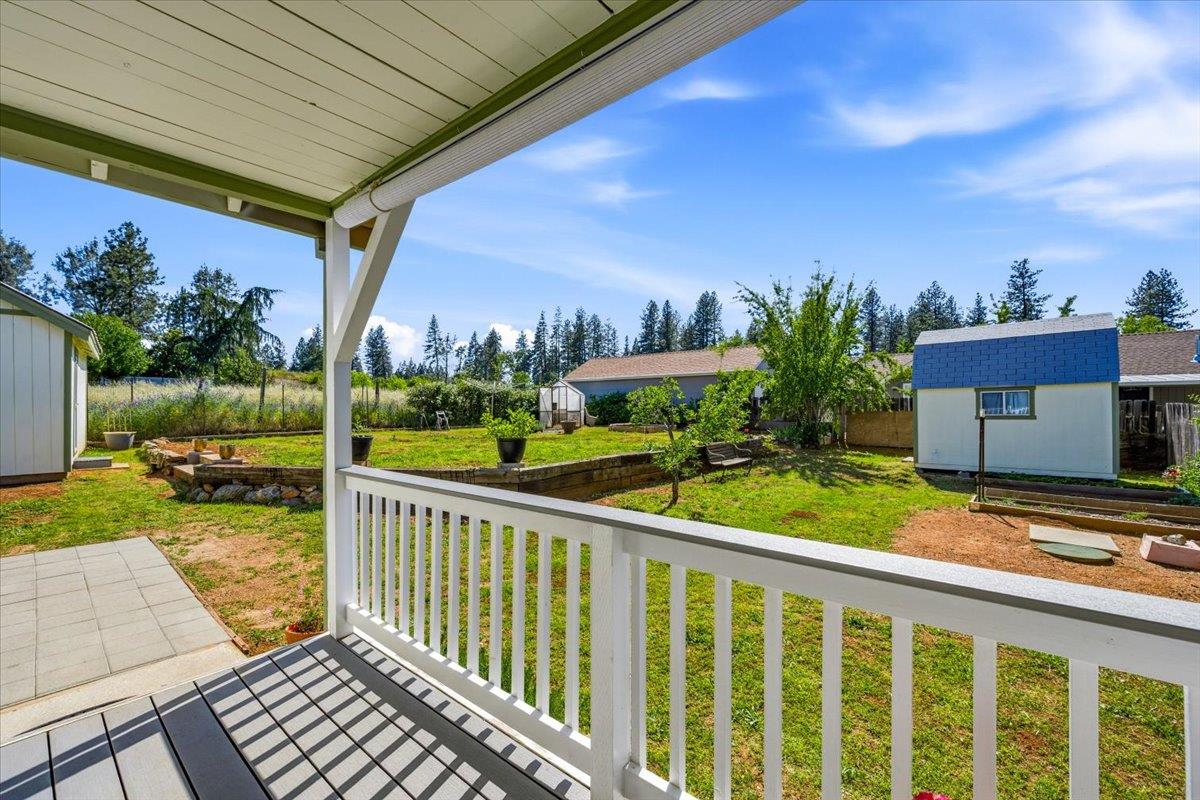 232 Upper Slate Creek Road Grass Valley, CA 95945 - Photo 24 of 48 a view of a house with backyard and sitting area
