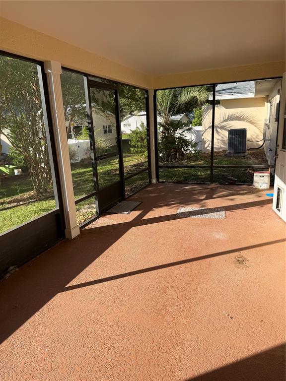 9529 Southwest 85th Avenue, Unit D Ocala, FL 34481 - Photo 19 of 21 a view of a room with large windows