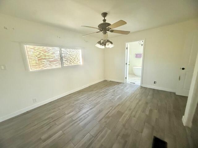 51555 Monroe Street Indio, CA 92201 - Photo 18 of 29 a view of empty room with wooden floor