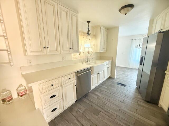 51555 Monroe Street Indio, CA 92201 - Photo 2 of 29 a kitchen with granite countertop white cabinets and white appliances