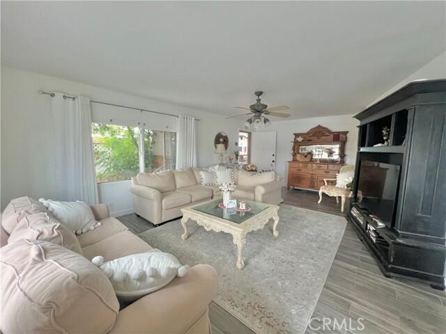 51555 Monroe Street Indio, CA 92201 - Photo 22 of 29 a living room with furniture large window and flat screen tv
