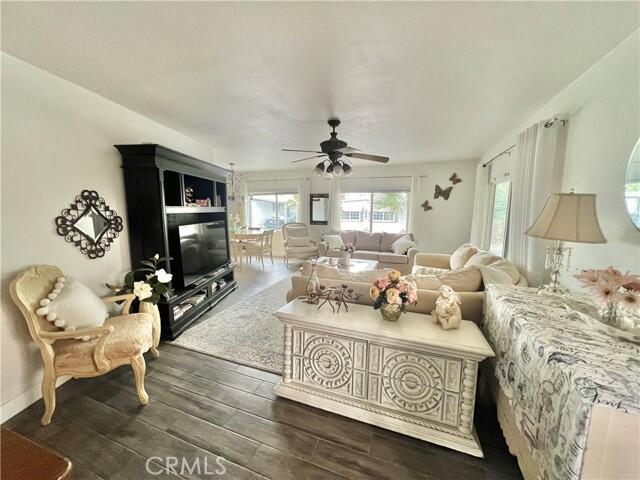51555 Monroe Street Indio, CA 92201 - Photo 23 of 29 a living room with furniture window and a flat screen tv