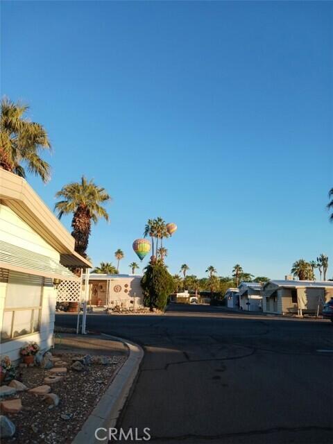 51555 Monroe Street Indio, CA 92201 - Photo 27 of 29 a view of a house with a yard