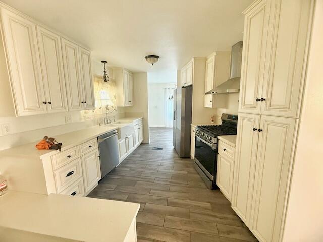 51555 Monroe Street Indio, CA 92201 - Photo 8 of 29 a large kitchen with a stove a sink dishwasher and a refrigerator