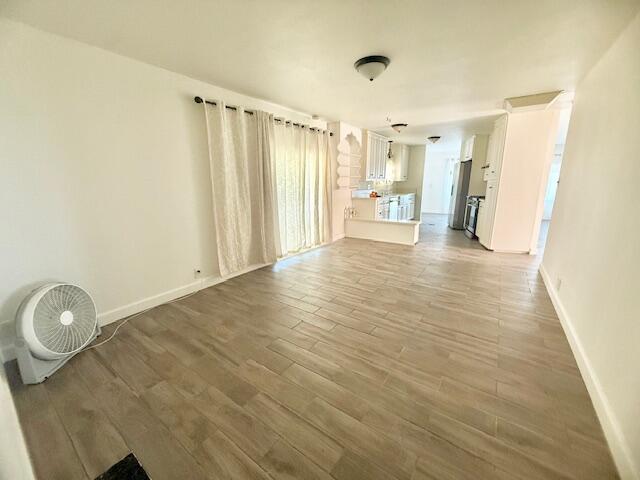 51555 Monroe Street Indio, CA 92201 - Photo 10 of 29 a view of a livingroom with wooden floor