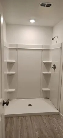 a view of an empty walk in closet