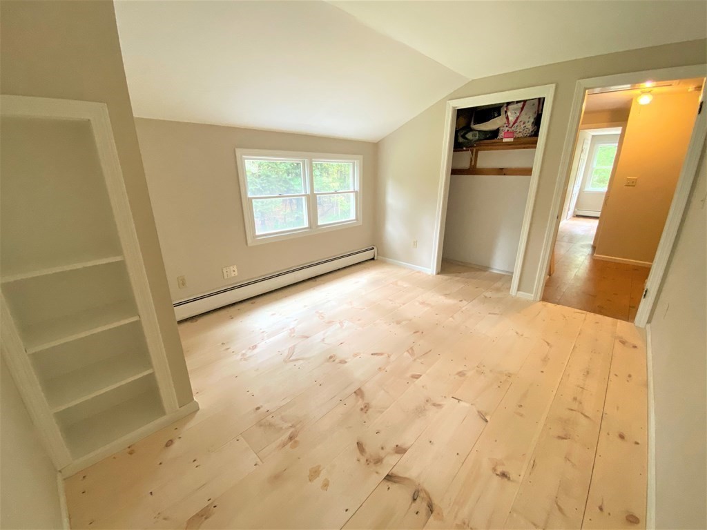 49 Mill Road Boxford, MA 01921 - Photo 29 of 40 a view of livingroom with wooden floor and front door