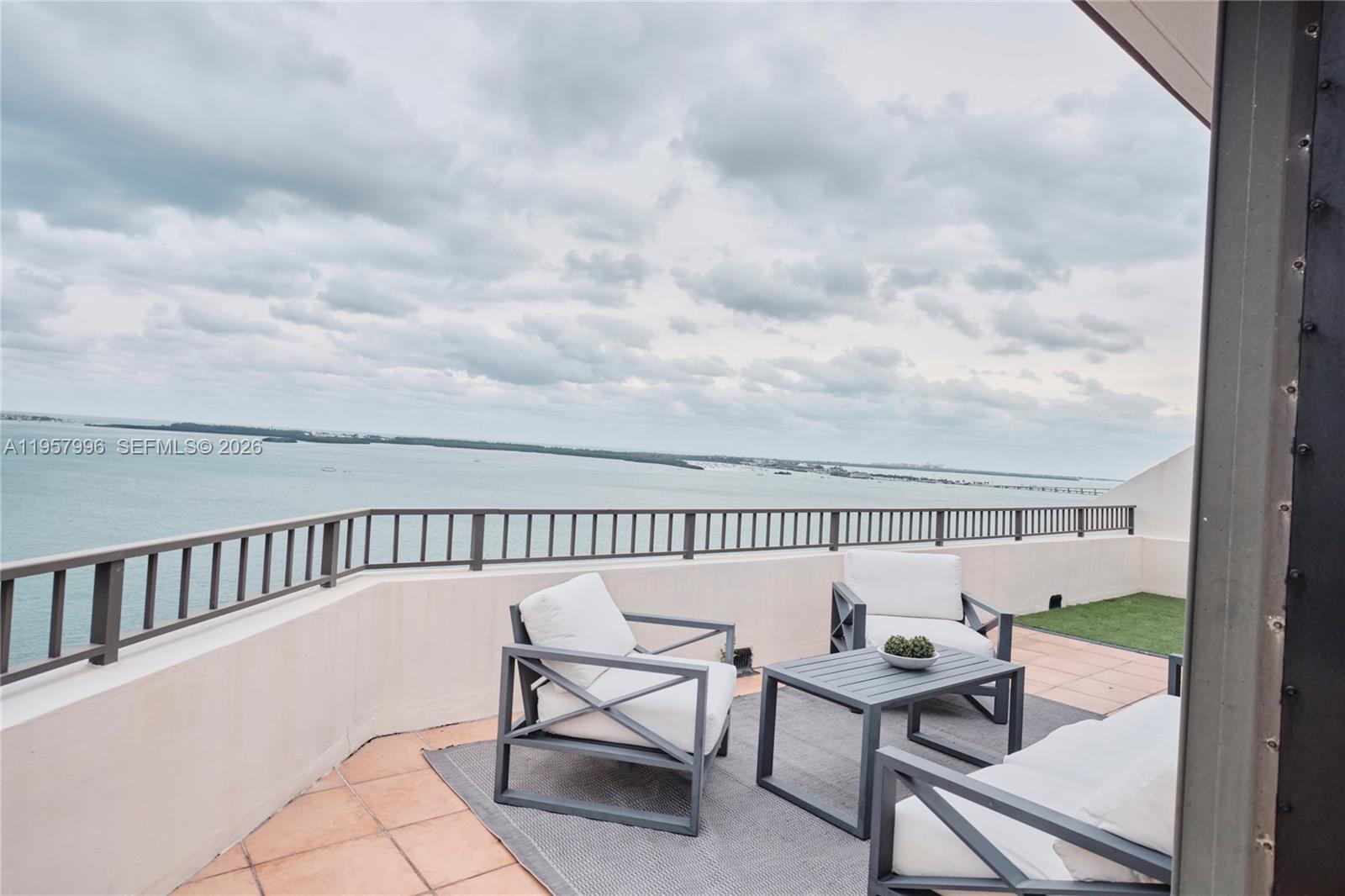 520 Brickell Key Drive, Unit A1904 Miami, FL 33131 - Photo 4 of 27 a view of balcony with furniture