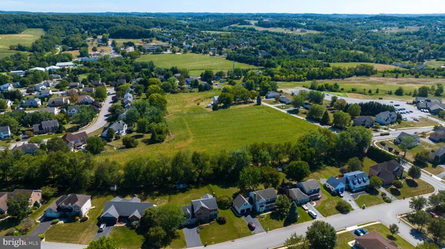 a view of a lake with a park