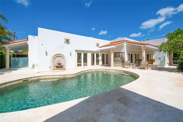 a view of a park with large trees