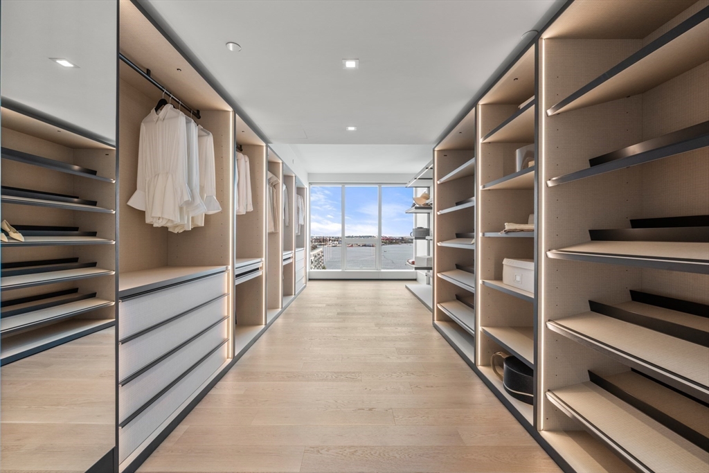 150 Seaport Boulevard, Unit 15CD Boston, MA 02210 - Photo 18 of 39 a view of walk in closet with empty racks