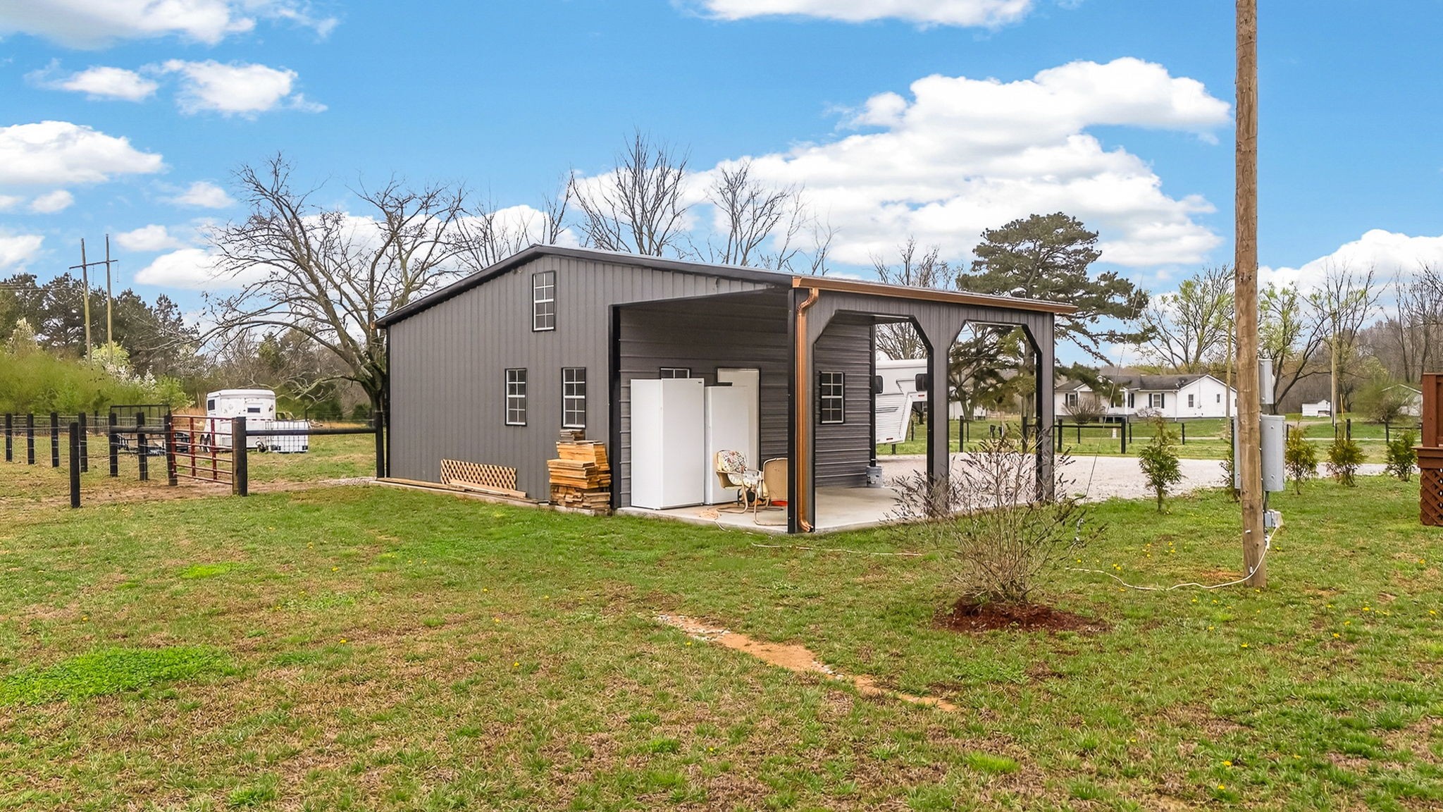 1765 Sugartree Springs Road Belvidere, TN 37306 - Photo 12 of 42 a large tree in front of a house