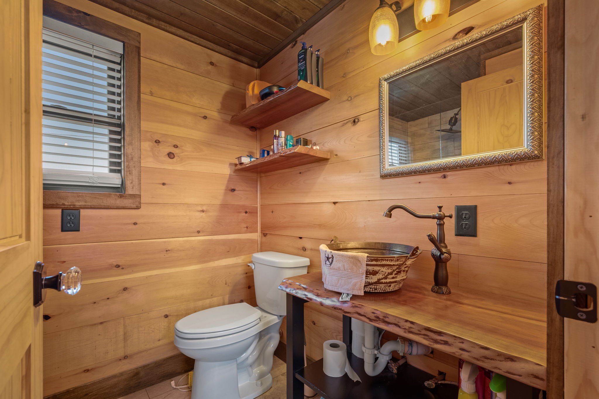 1765 Sugartree Springs Road Belvidere, TN 37306 - Photo 36 of 42 a bathroom with a sink a toilet and a mirror