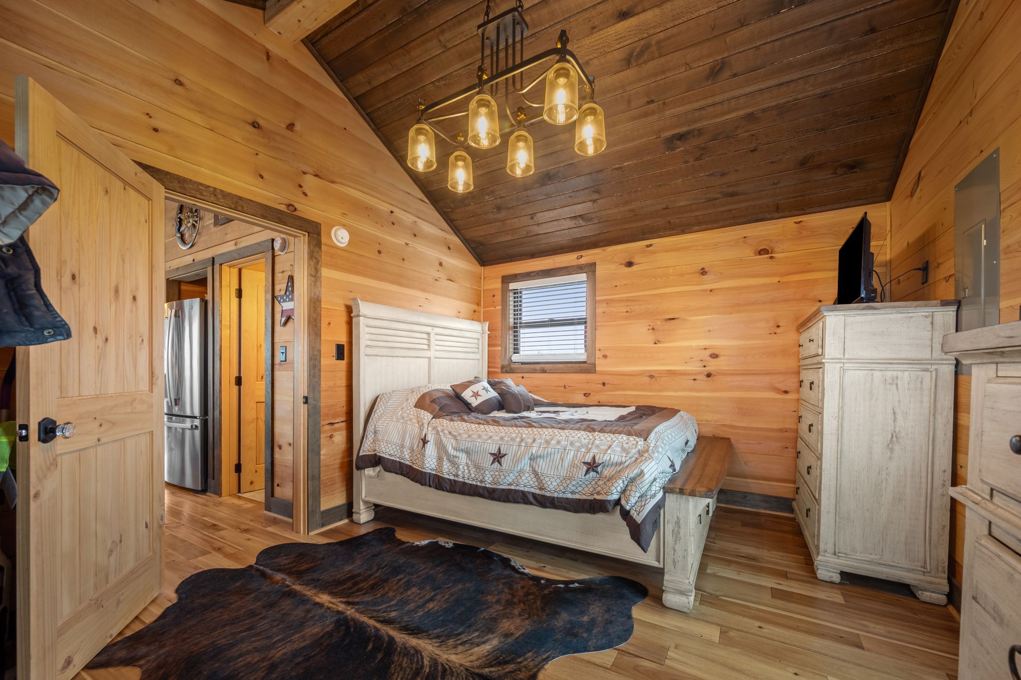 1765 Sugartree Springs Road Belvidere, TN 37306 - Photo 40 of 42 a bedroom with a bed and wooden floor