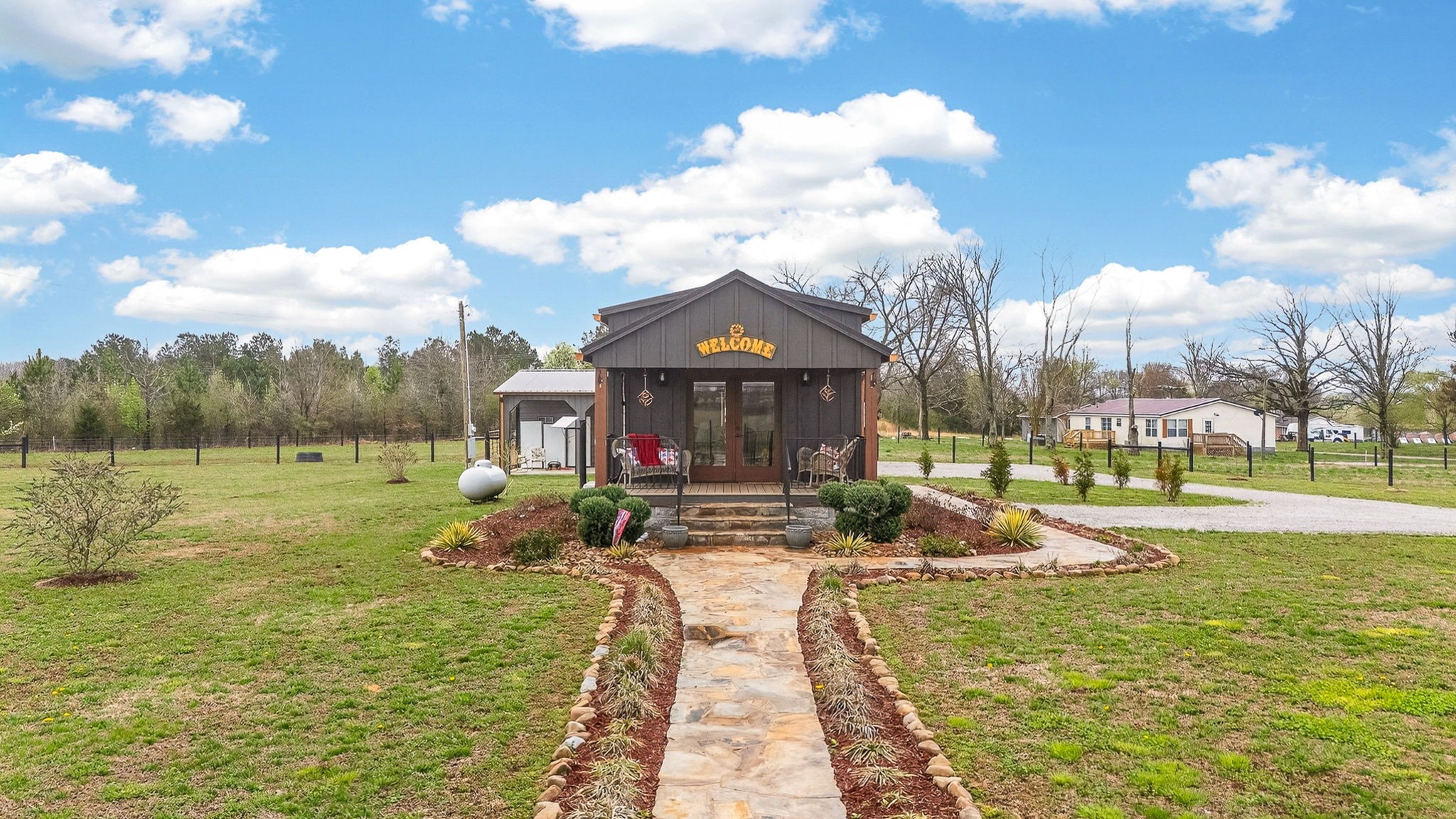 1765 Sugartree Springs Road Belvidere, TN 37306 - Photo 5 of 42 a view of a house with a yard