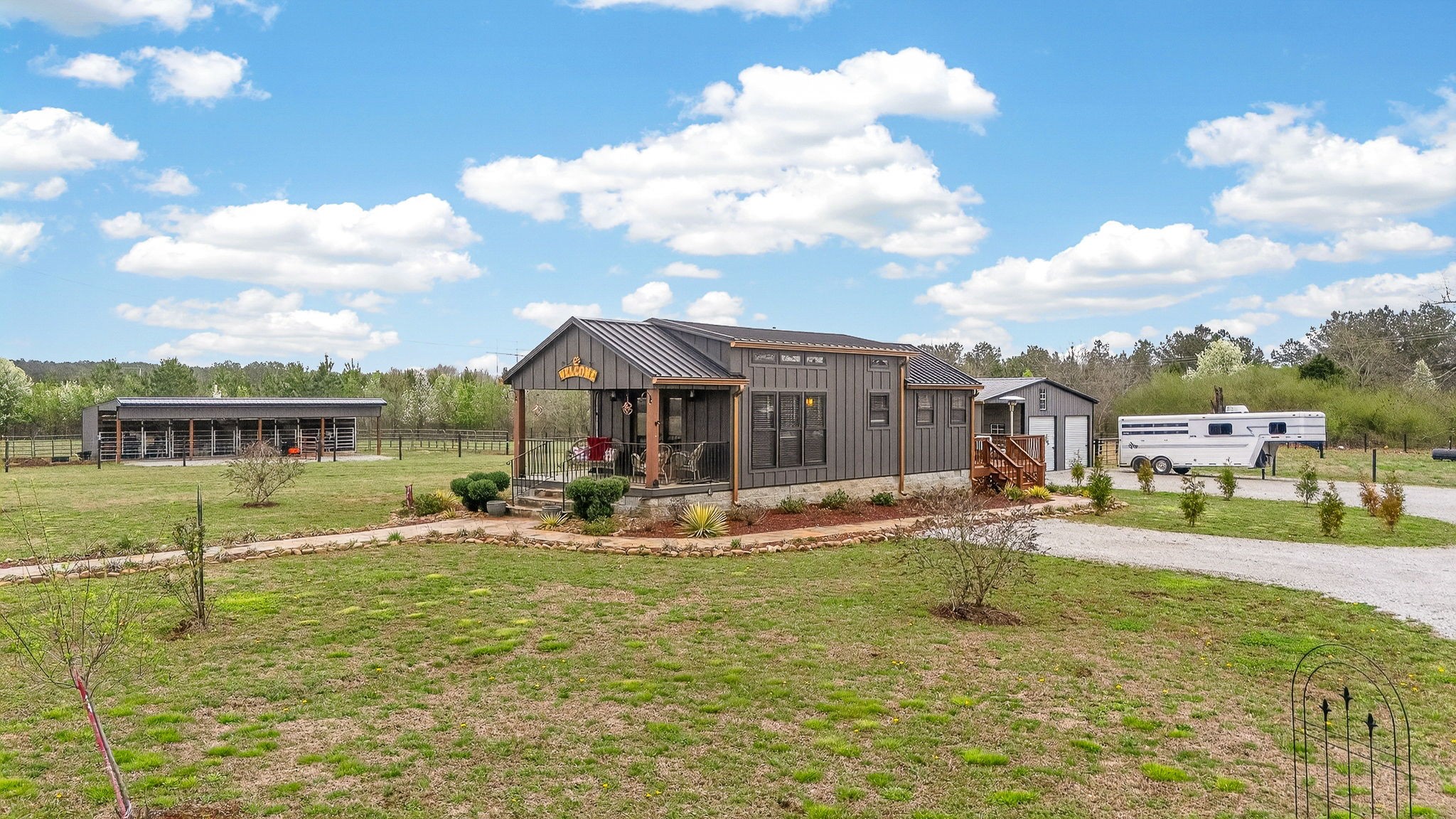 1765 Sugartree Springs Road Belvidere, TN 37306 - Photo 7 of 42 a front view of a house with garden
