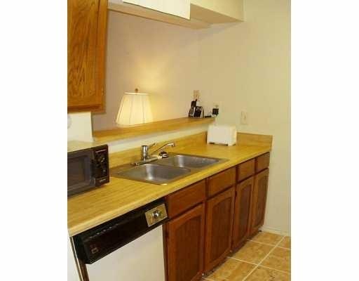 6702 Everhart Road, Unit S101 Corpus Christi, TX 78413 - Photo 2 of 4 a bathroom with a sink and a mirror