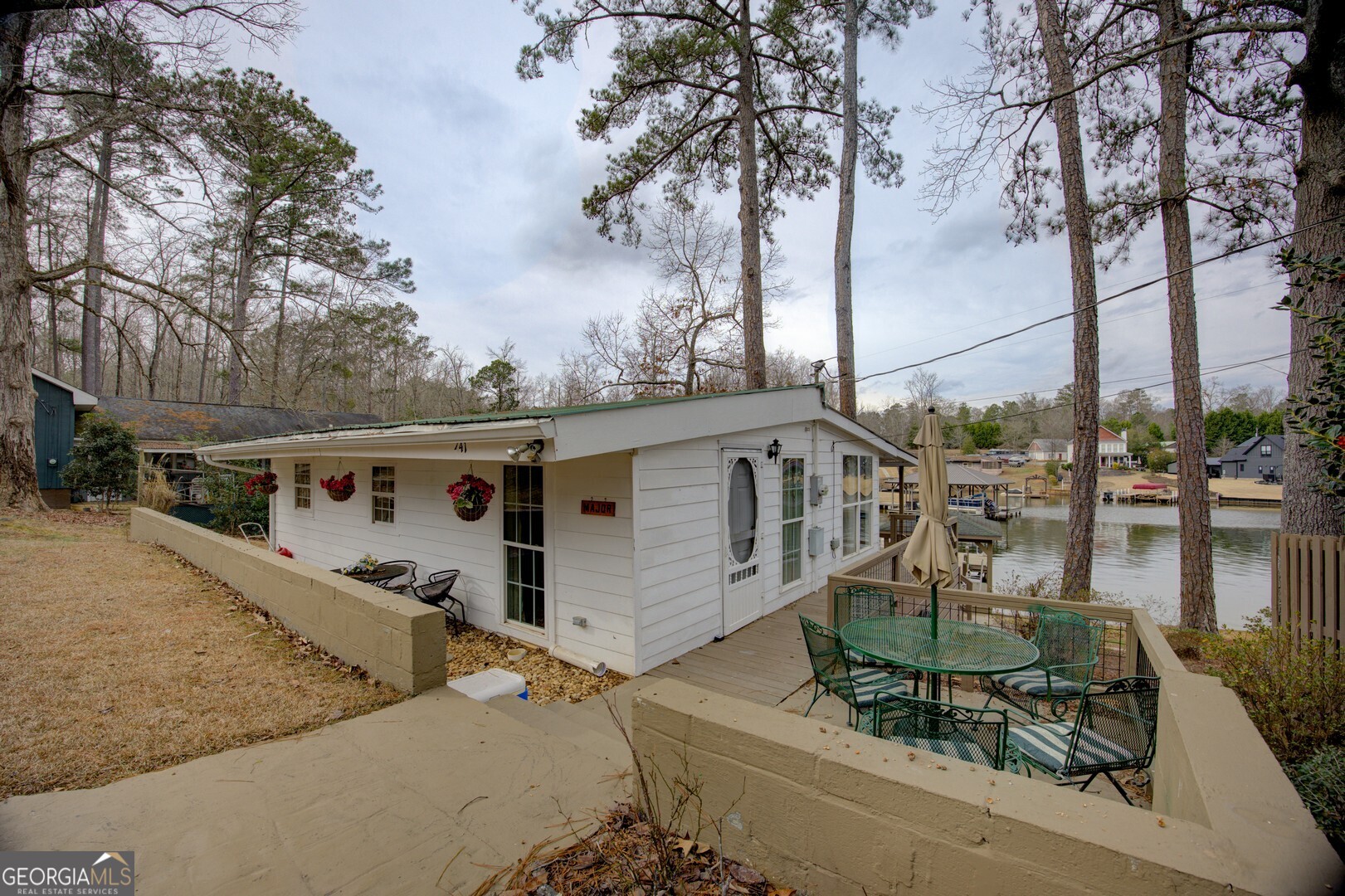 141 Andrea Circle Jackson, GA 30233 - Photo 24 of 41 a front view of a house with lake view