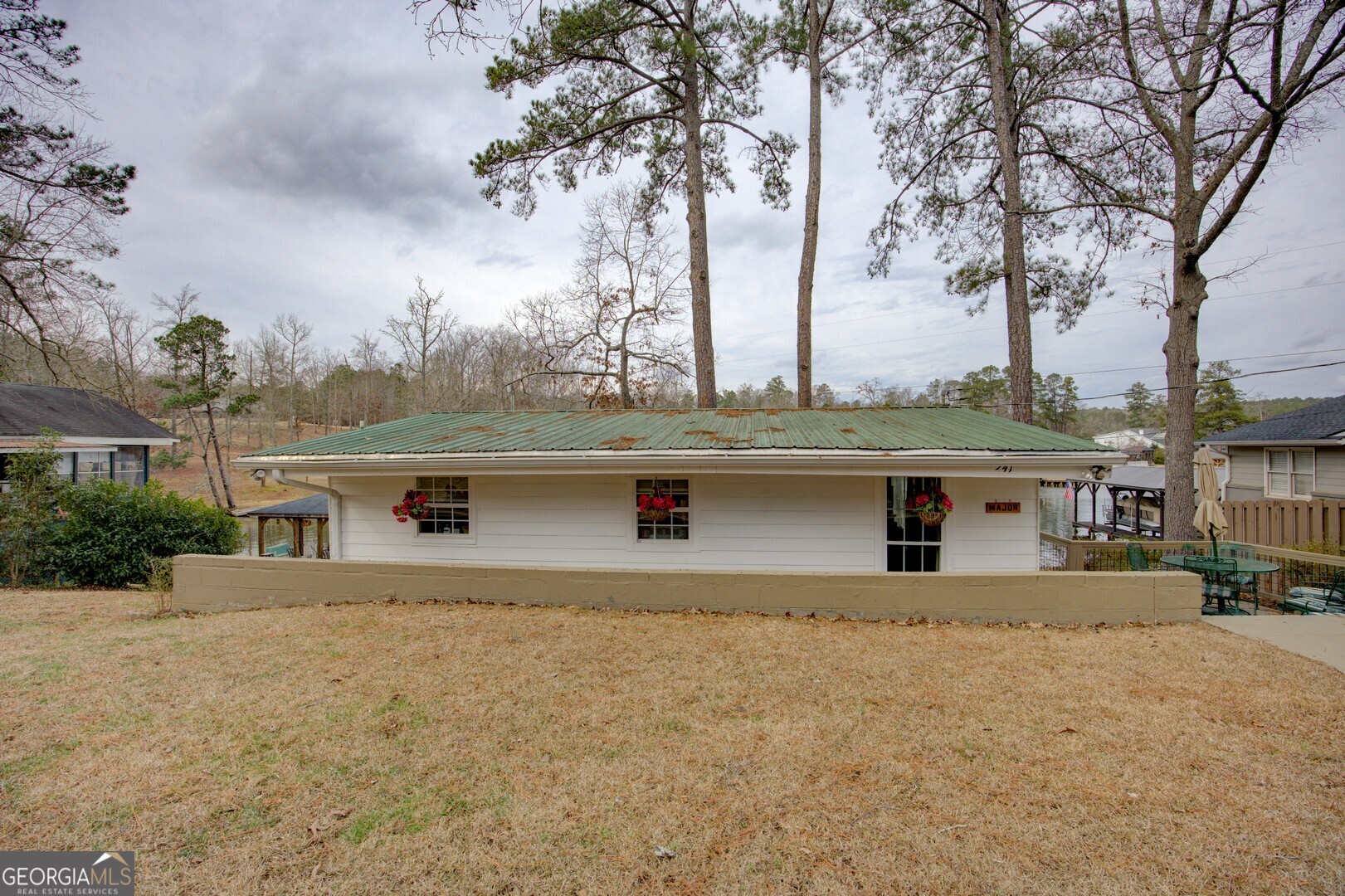 141 Andrea Circle Jackson, GA 30233 - Photo 25 of 41 an house with trees in front of it