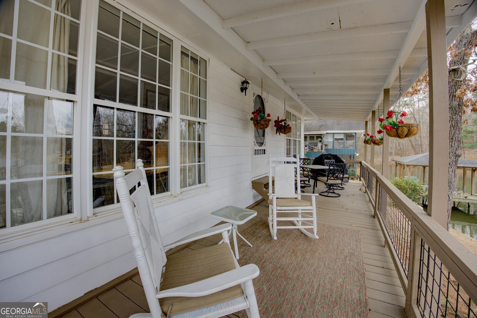 141 Andrea Circle Jackson, GA 30233 - Photo 26 of 41 a view of a dining room with furniture a rug and wooden floor