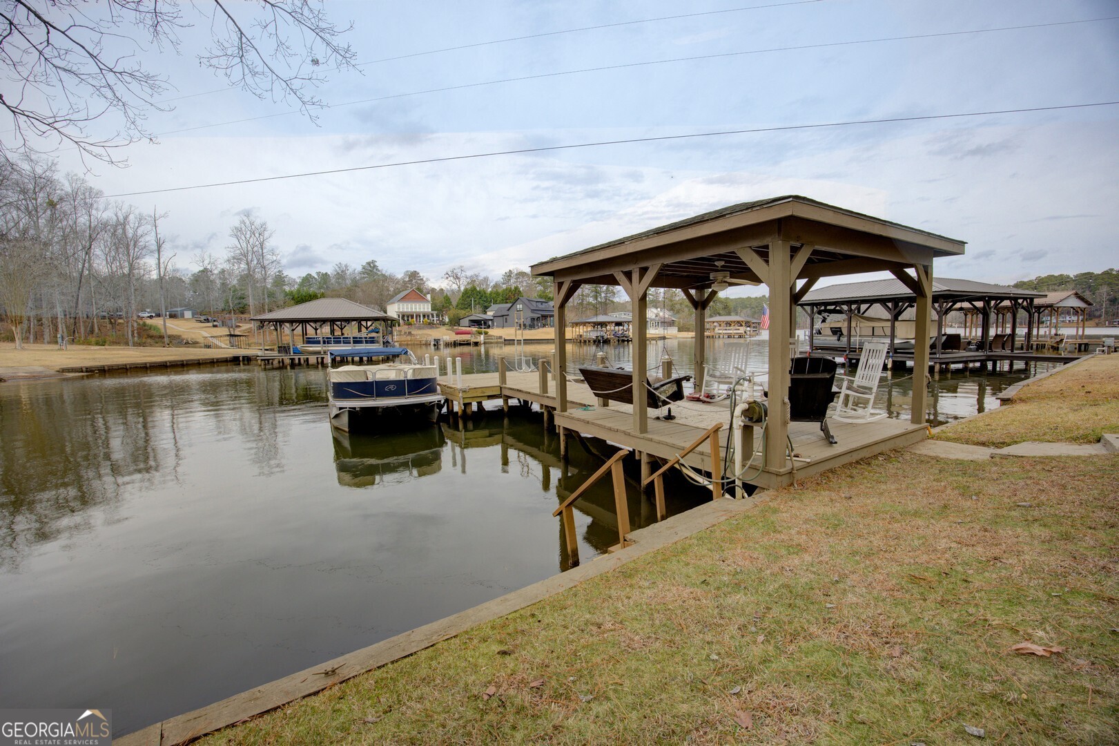 141 Andrea Circle Jackson, GA 30233 - Photo 28 of 41 a view of a lake with outdoor seating