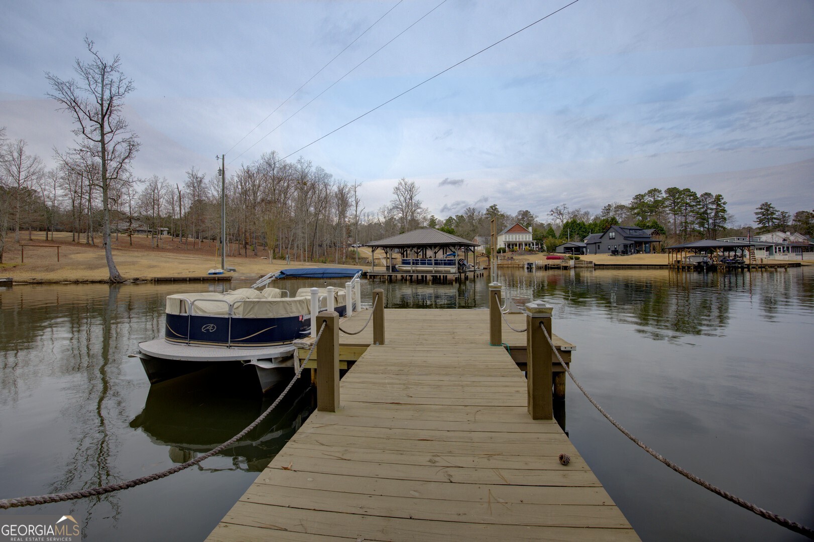 141 Andrea Circle Jackson, GA 30233 - Photo 30 of 41 a lake view with tables and chairs