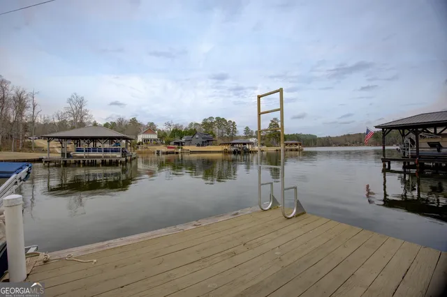 a view of a swimming pool with a patio