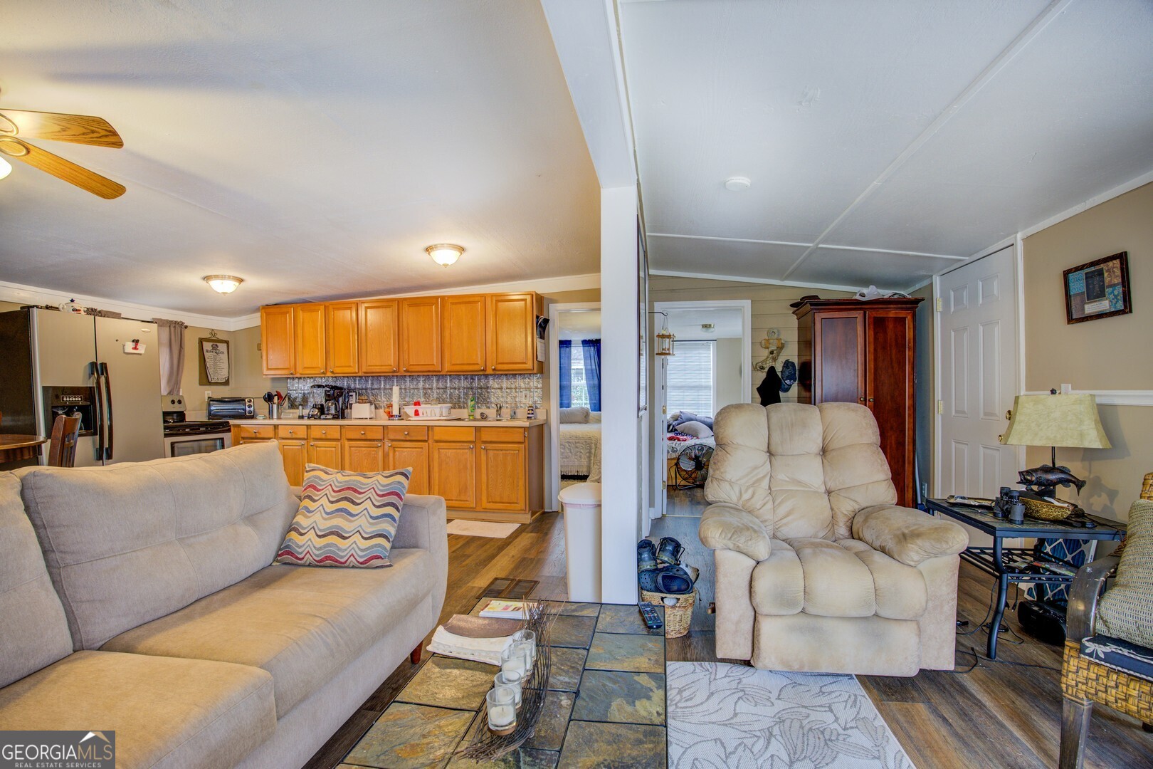 141 Andrea Circle Jackson, GA 30233 - Photo 9 of 41 a living room with furniture and a large window
