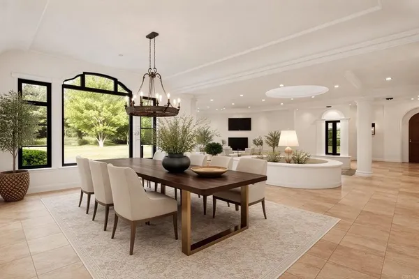 a kitchen with granite countertop a sink a stove and cabinets