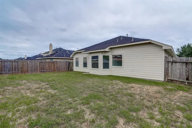 a house view with a garden space