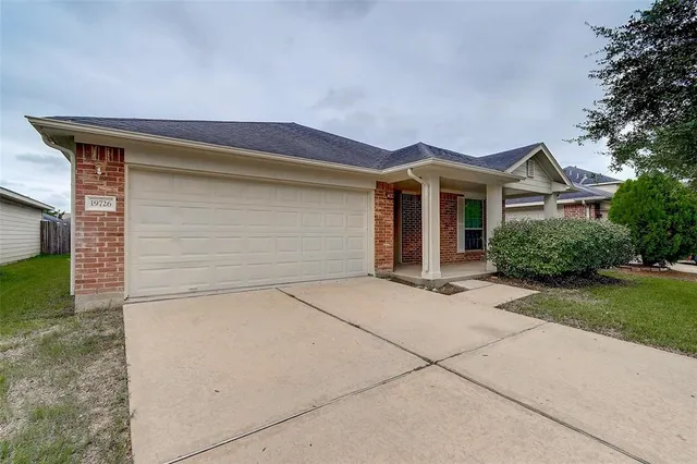 front view of a house with yard