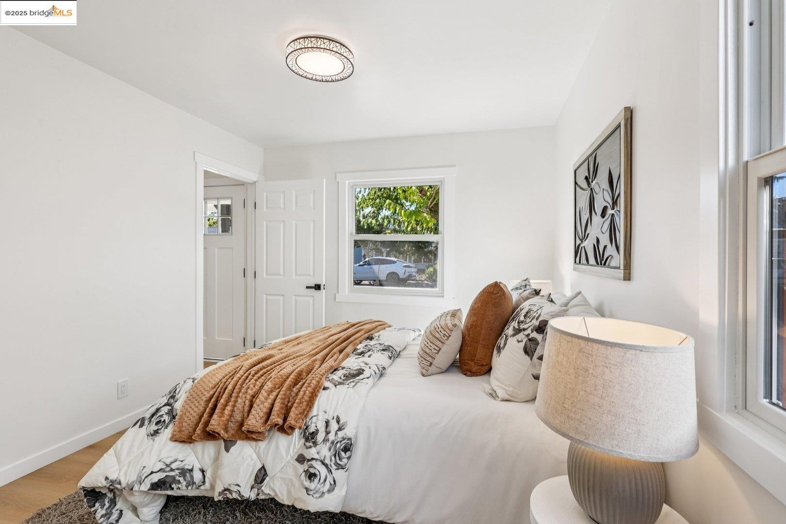 4185 Huckleberry Drive Concord, CA 94521 - Photo 20 of 33 a bedroom with a bed and a painting on the wall