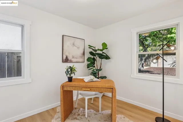 a vase of flowers sitting on a table
