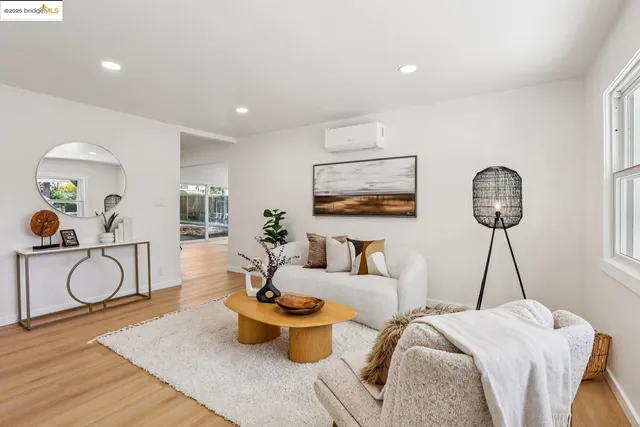 a bed room with furniture and a window