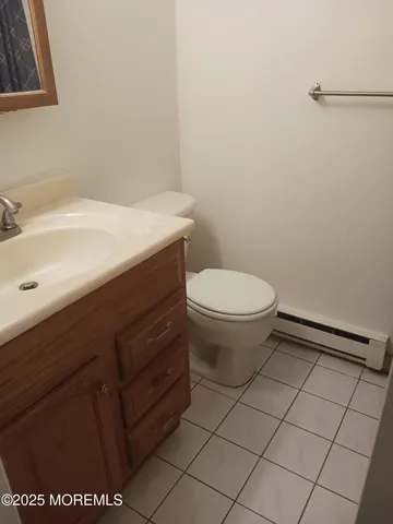 a bathroom with a sink and a toilet