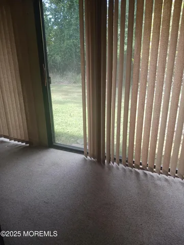 a view of a room with a door