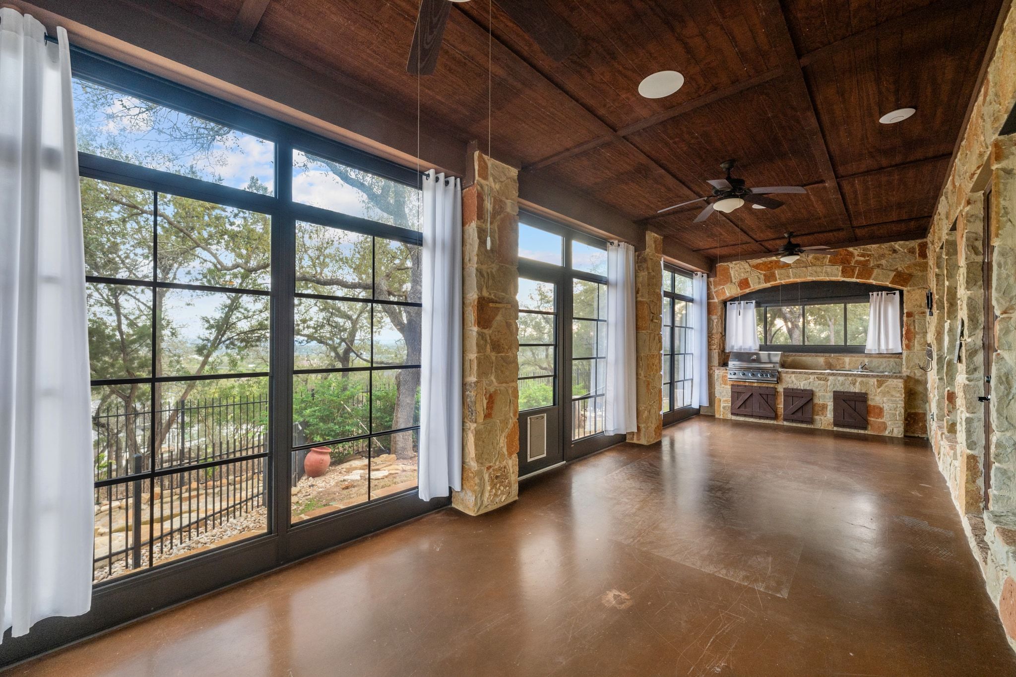 3701 Copper Ridge Court Austin, TX 78734 - Photo 24 of 30 a view of a hall with wooden floor