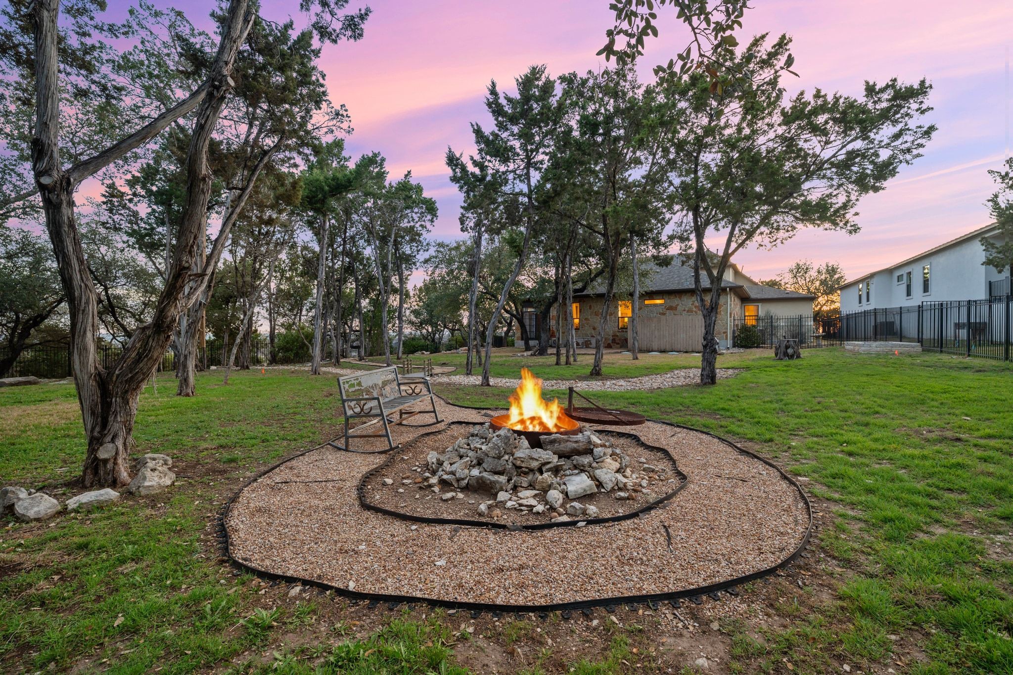 3701 Copper Ridge Court Austin, TX 78734 - Photo 26 of 30 a view of a fire pit with a sink