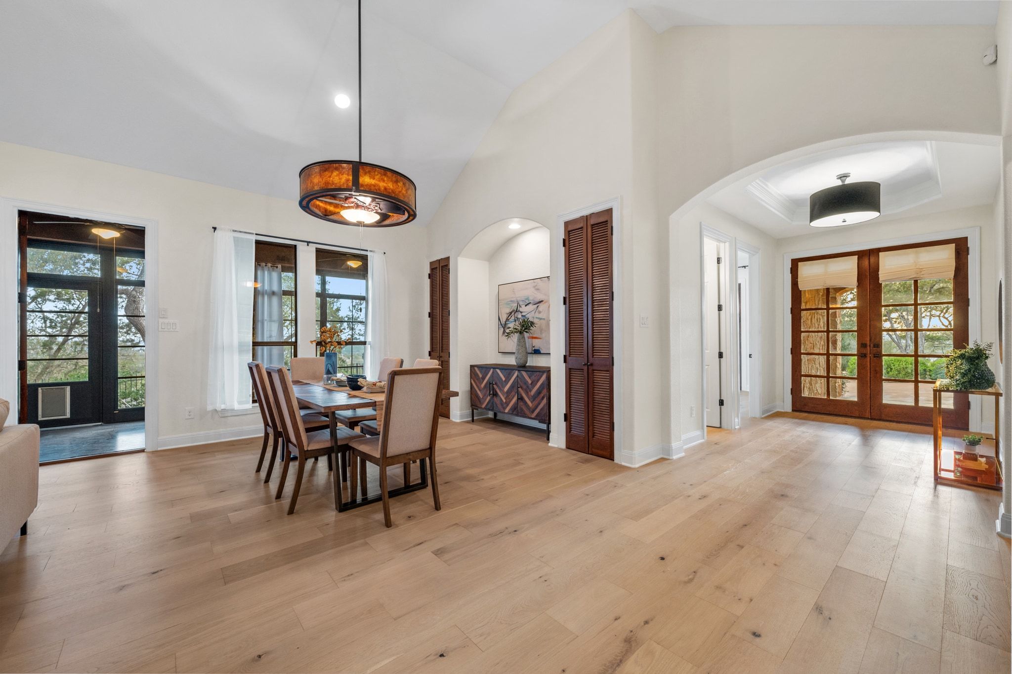 3701 Copper Ridge Court Austin, TX 78734 - Photo 7 of 30 a view of a dining room with furniture and chandelier