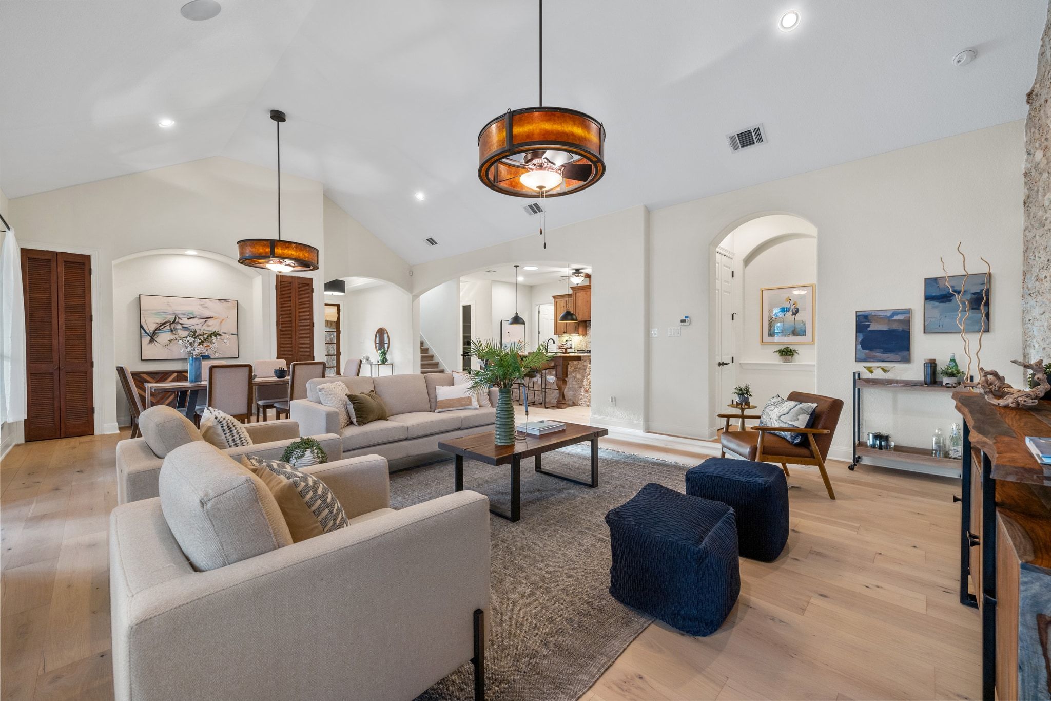 3701 Copper Ridge Court Austin, TX 78734 - Photo 8 of 30 a living room with furniture and a chandelier