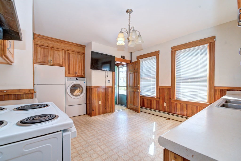 89-91 Larchwood Road Methuen, MA 01844 - Photo 14 of 39 a view of livingroom with washer and dryer