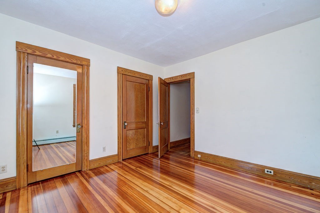 89-91 Larchwood Road Methuen, MA 01844 - Photo 20 of 39 a view of empty room with wooden floor