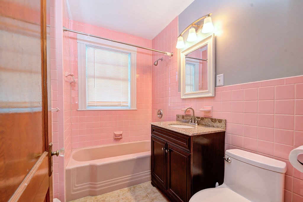 89-91 Larchwood Road Methuen, MA 01844 - Photo 21 of 39 a bathroom with a sink toilet vanity and bathtub
